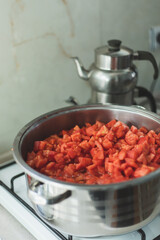 Canned tomato sauce, prepared at home.Harvesting for the winter. tomato sauce preparation for winter