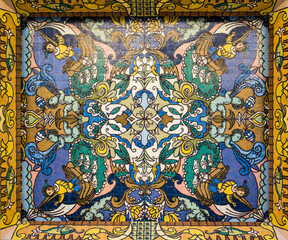 colorful tile art on a ceiling of a building at porto