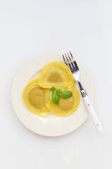 Tasty ravioli on white background. Italian food concept.
