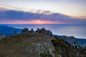 Fototapeta premium beautiful mountains at sunrise against the background of white clouds