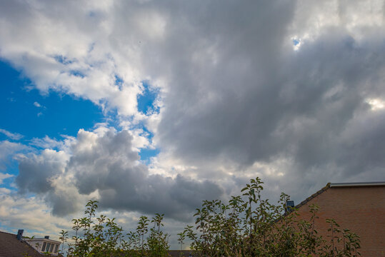 Panorama of white altocumulus clouds in a blue  sky in autumn, Almere, Flevoland, The Netherlands, October 12, 2020