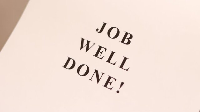 Printer prints the sheet of paper with text "JOB WELL DONE!"