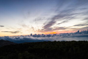 beautiful mountains at sunset against the backdrop of storm clouds
