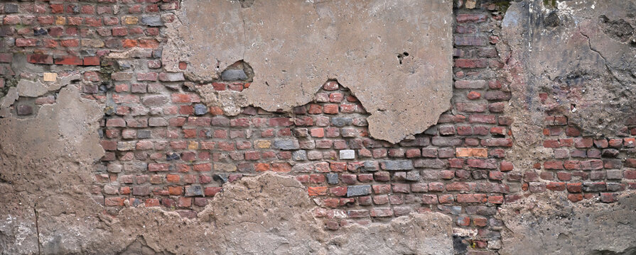 Banner, alte Ziegelsteinmauer mit verwittertem Putz