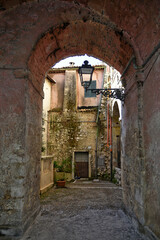 An alley among the old houses of Fiuggi, a medieval village in the Lazio region.