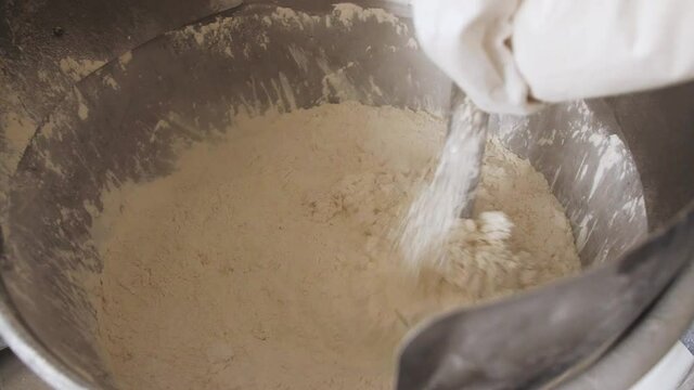 bread dough and mixer, industrial dough mixer kneads the dough