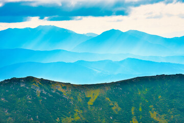 Blue mountains summit nature landscape with fog and mist