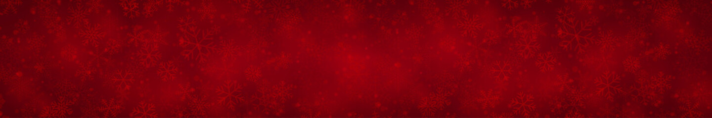 Christmas banner of snowflakes of different shapes, sizes and transparency on red background