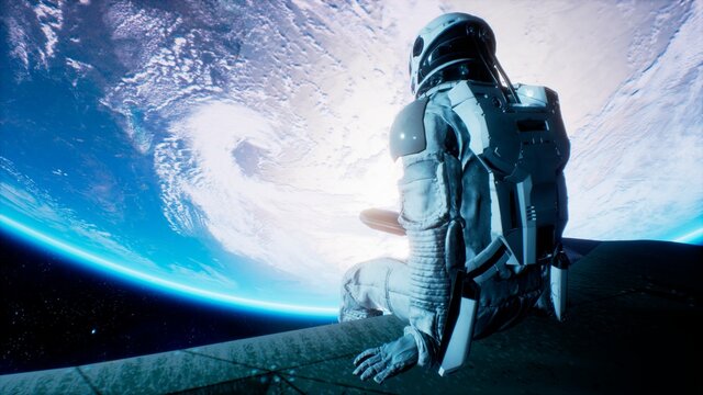 An astronaut sits on the wing of his spaceship and swings his legs looking at the blue planet. 3D Rendering.