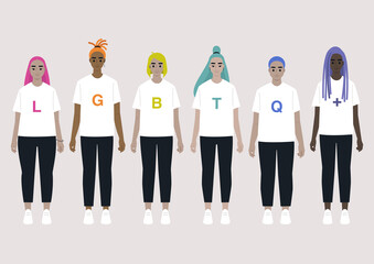 A group of young people with colorful hair wearing an LGBTQ+ sign on their t shirts