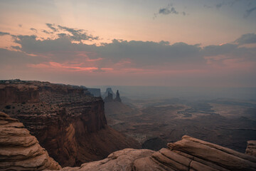 Obraz premium Beautiful sunrise dramatic sky over desert canyon in the Canyonlands National Park. View from above