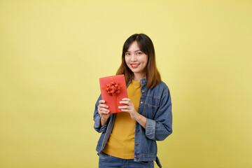 Portrait beautiful young asian woman with red gift box