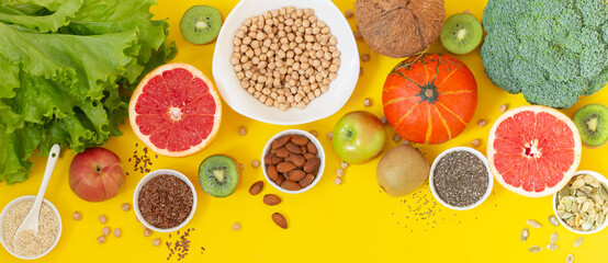 Healthy food banner. Organic vegetables, fruits, seeds and herbs top view