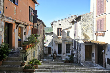 A narrow street among the old houses of Fiuggi, a medieval village in the Lazio region.