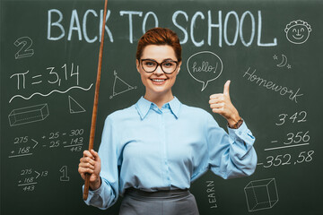 geometry teacher with pointing stick showing thumb up near chalkboard with back to school lettering and illustration © LIGHTFIELD STUDIOS