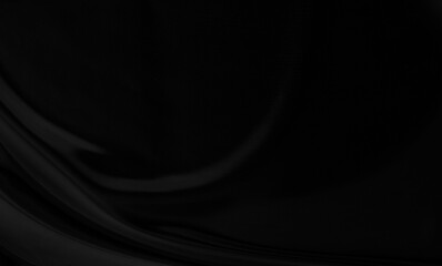 Black gray satin dark fabric texture luxurious shiny that is abstract silk cloth background with patterns soft waves blur beautiful.