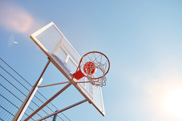 Basketball hoop located outdoors on a sports court © Afshar Tetyana