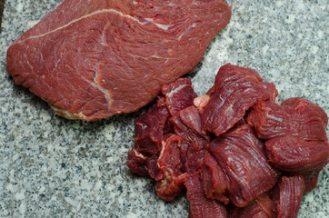 Fresh beef meat on a granite stone.