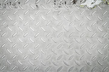 Diamond plate steel pavement background in vintage style for industry or constuction