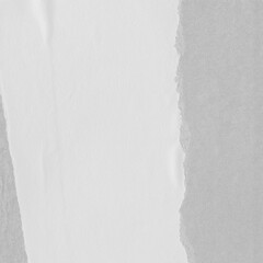 White torn paper collage close-up. Texture made from various paper and cardboard parts. Damaged old paper background. Vintage blank wallpaper. Material design backdrop.