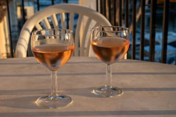 Drinking of local rose wine in summer Provence, France