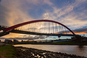 Fototapeta na wymiar Sunset view of the beautiful Rainbow Bridge
