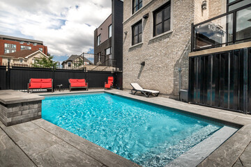 Fototapeta na wymiar Big modern luxury furnished house in Montreal with swimming pool and backyard