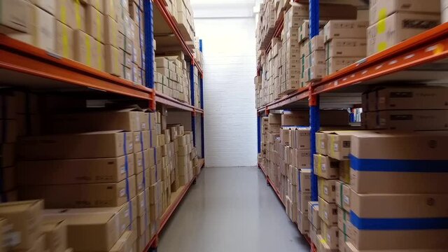 An industrial warehouse full of merchandising on shelving