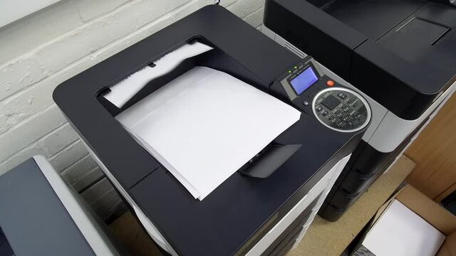 Office laser jet printer printing lots of paper