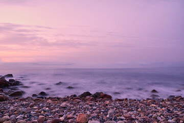 Rocky beach at sunrise, colors