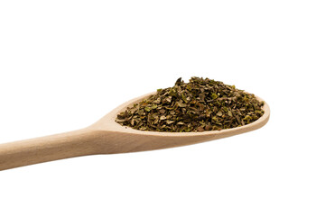 Oregano spice in wooden spoon isolated.