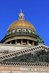 Saint Isaac's cathedral dome details in St Petersburg, Russia. Christian church facade elements, close up view of famous cathedral in Saint Petersburg city center