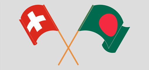 Crossed and waving flags of Bangladesh and Switzerland