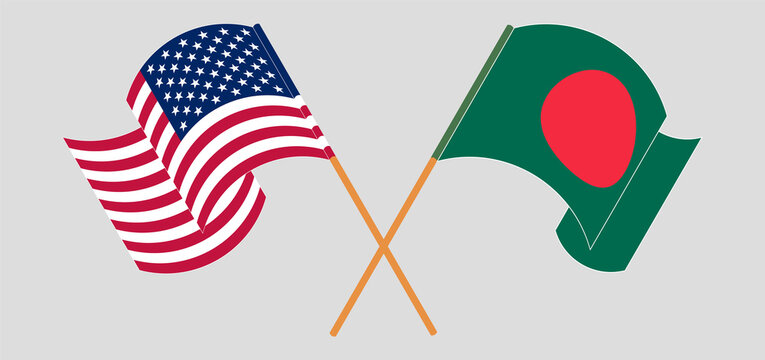 Crossed and waving flags of Bangladesh and the USA