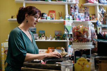 Toy Shop Owner Busy Doing Administrative Work
