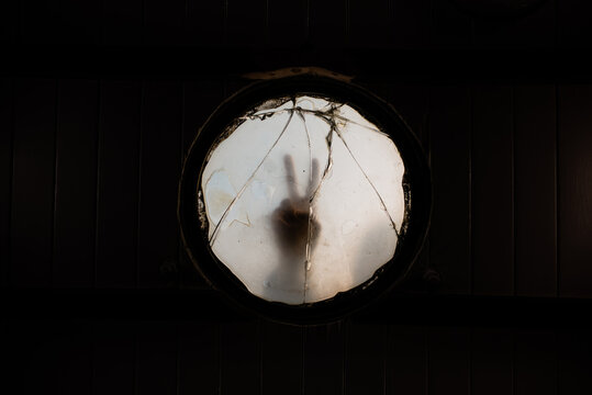 peace sign in window