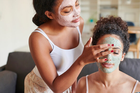 Young woman getting a facial treatment
