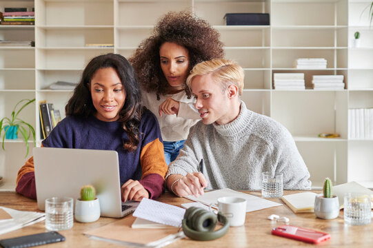 Young people using a laptop