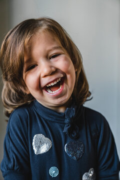 Cute girl laughing for camera