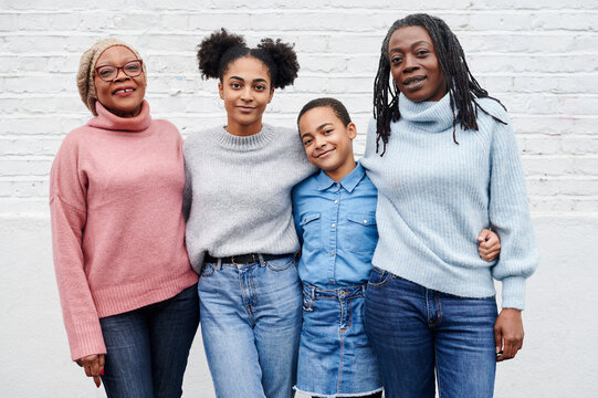 Smiling Women Of A Multigenerational Family