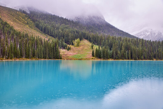 Raining in a blue lake, Bow Lake, Rocky Mountains, Canada.