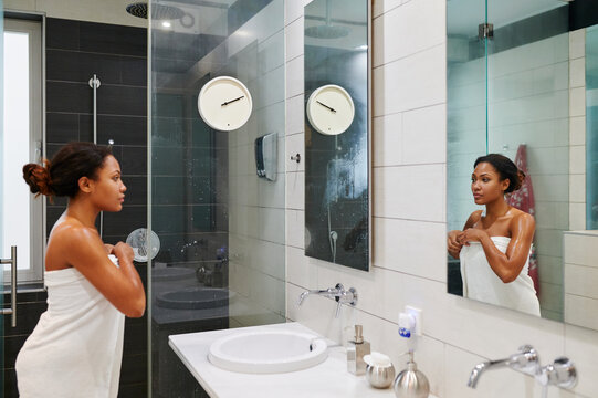 Woman getting ready in her bathroom