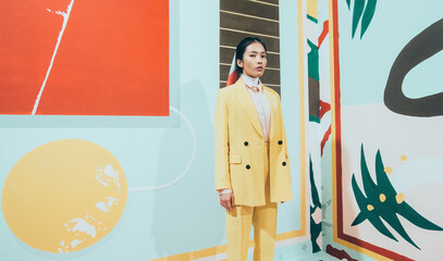 Fashion Model In Colorful Abstract Space .