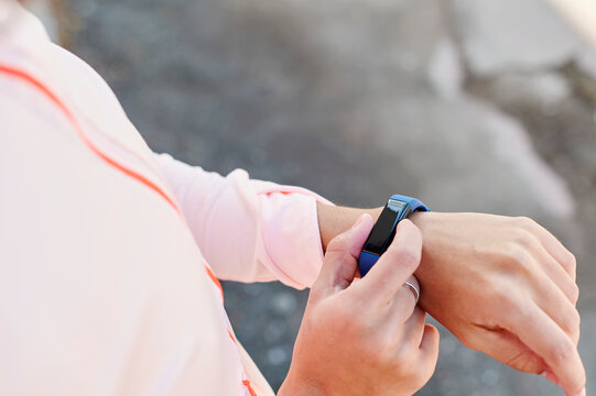 Woman checking her fitness tracker