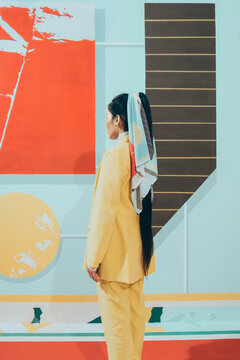 Fashion Model In Colorful Abstract Space .