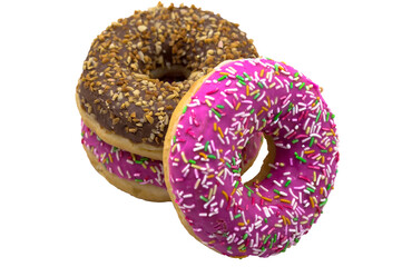 Pink and brown doughnut. Strawberry and raspberry doughnuts. Walnut donut on a white background.