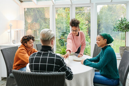 Teenagers preparing for dinner