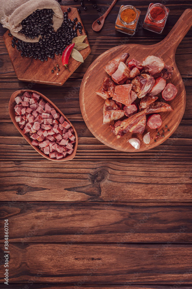 Sticker ingredients for a typical brazilian meal feijoada - top view with space copy