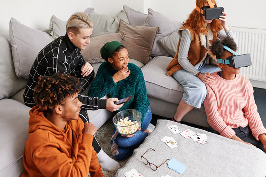 Teens playing with VR headsets