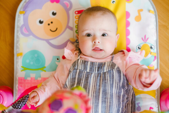 Baby on play mat